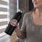 cropped-face-mockup-of-a-middle-aged-woman-holding-an-aluminum-bottle-33490_compressed.jpg