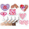 Red-purple-pink garland for valentine's day, sweet tiered cake for Galentine's Day, red lip glasses, non-inflated balloons, purple nail polish, strawberry toppe