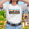 MR-1352023154756-magic-kingdom-skyline-retro-style-t-shirt-image-1.jpg