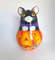 Figurine of a big black cat on a pumpkin , roly poly with a jingle (21).jpg
