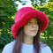 Red ruby faux fur bucket hat. Stylish fluffy hat for festivals and every day.
