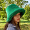 Green faux mink fur bucket hat. Stylish deep green fluffy hat. Cute winter bucket hat.