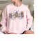 MR-23102023103442-halloween-nurse-sweatshirt-spooky-nurse-sweatshirt-cute-image-1.jpg