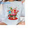 MR-30102023172435-disney-alice-in-wonderland-christmas-coffee-cup-balloon-shirt-image-1.jpg
