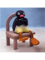 Very Angy Pingu Sitting On A Chair  .png