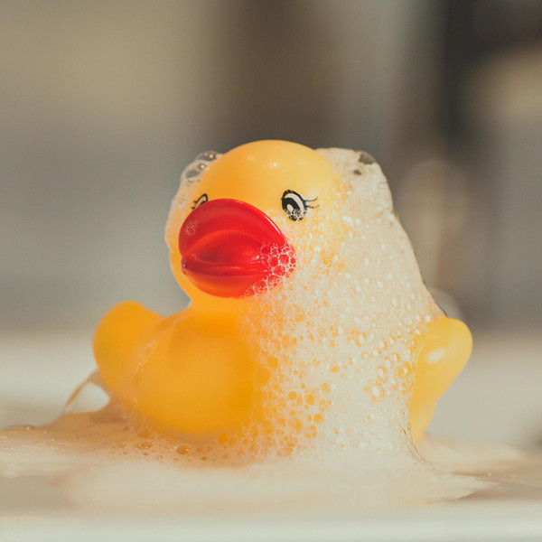 Yellow Rubber Duck For Bath Time Stock Photo - Download Image Now