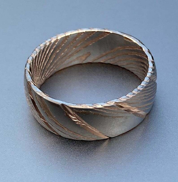 Dazzling_Damascus_Steel_Wedding_Ring_Set_with_Wood_Case_–_Perfect_Bands_for_Men_and_Women (4).jpg