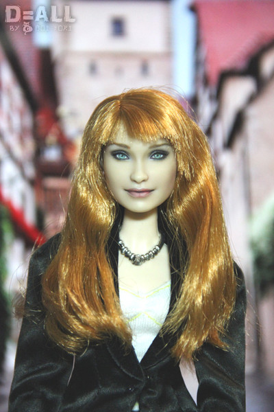 Barbie doll orange long hair realistic face