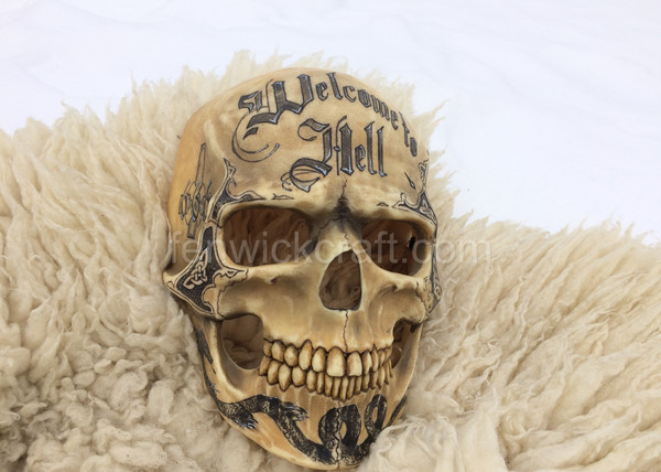 skull mask with dragon tattoos