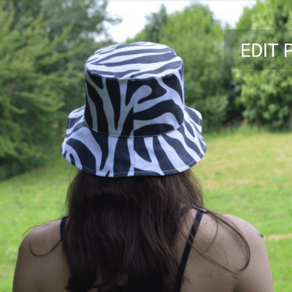 Cotton bucket hat with zebra print. A fashionable, stylish designer hat with an animal print. Summer cute sun hat.