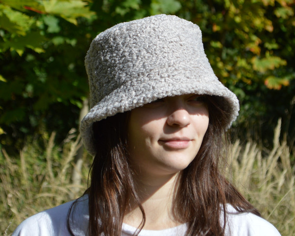 Reversible bucket hat for women. Cute winter hat made of faux suede. Fashion faux shearling and fur hat.Fluffy furry hat