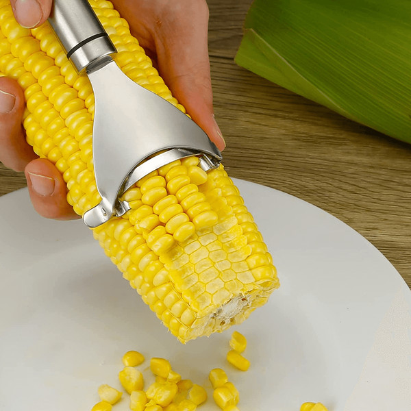 https://www.inspireuplift.com/resizer/?image=https://cdn.inspireuplift.com/uploads/images/seller_products/1664880016_cornslicerpeeler5.png&width=600&height=600&quality=90&format=auto&fit=pad
