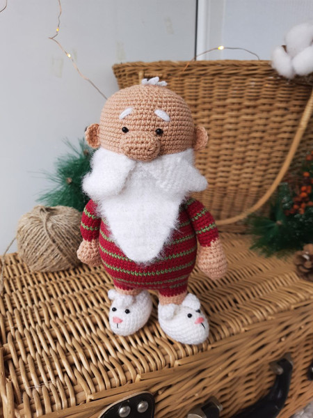 Santa Claus in home clothes cozy Christmas gift.jpg