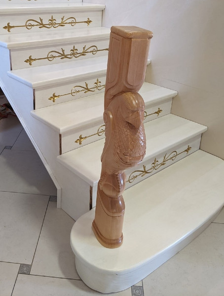 Unique-carved-wood-staircases-with-eagle-post.jpg