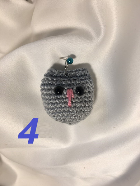 Cute-light-grey-amigurumi-owl-number-4-with-litlle-black-eyes-crochet-charms-handmade-keyrings-Eyeletshop-handmade-Eyeletshop-amigurumi.jpg