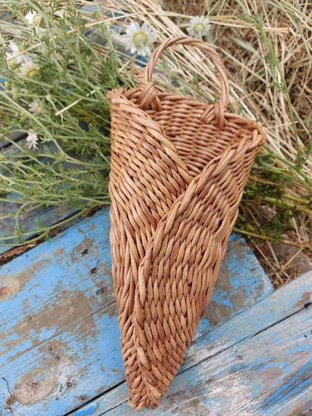 Hanging wicker basket.