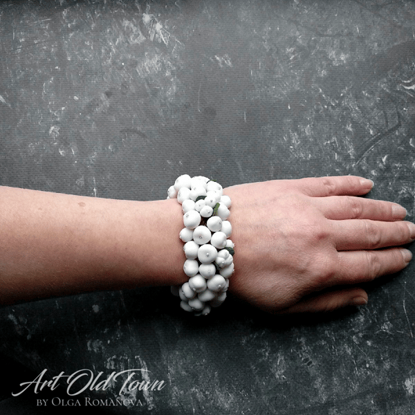 Bracelet with snowberry and leaves on waxed cords available-On-the-hand.jpg