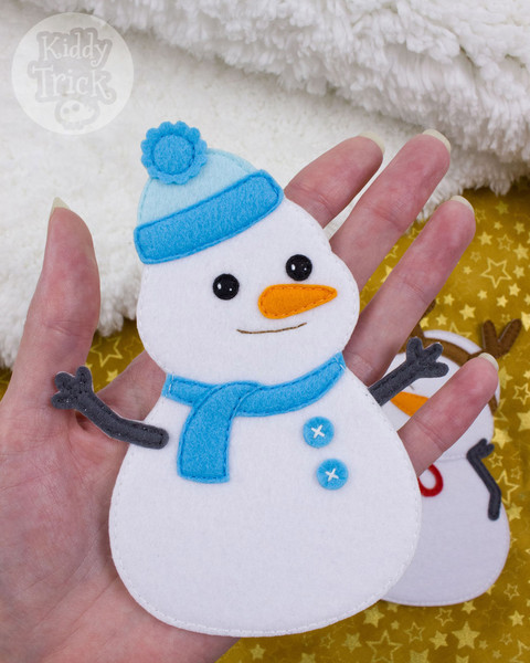 felt snowman with blue hat and scarf