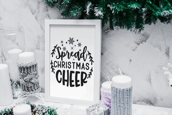 mockup-of-an-art-print-surrounded-by-christmas-candles-2091-el.png