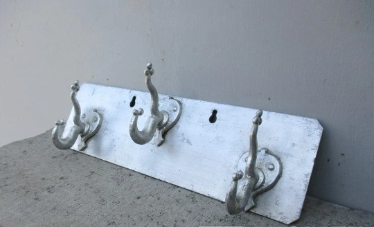 old antique metal hanger hooks