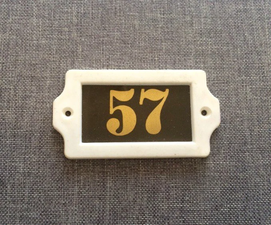 57 apartment door number sign