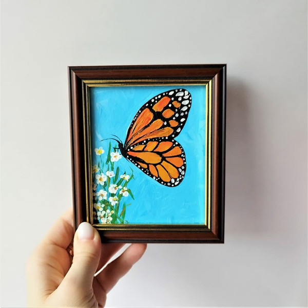 https://www.inspireuplift.com/resizer/?image=https://cdn.inspireuplift.com/uploads/images/seller_products/1672417293_Acrylic-painting-monarch-butterfly-and-wildflowers-in-style-impasto-framed-art-small-wall-decor1.jpg&width=600&height=600&quality=90&format=auto&fit=pad