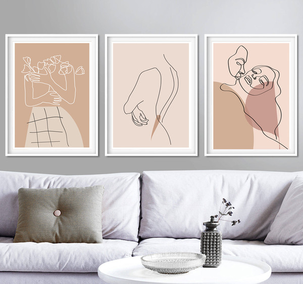 3 beige prints on the wall on the theme of love