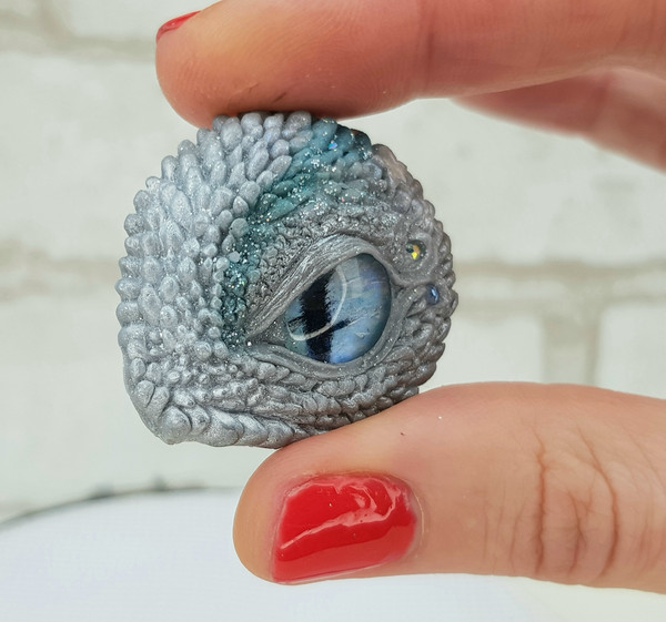 Gray Dragon Eye Needle Minder Magnet for Cross Stitch Gif.jpg