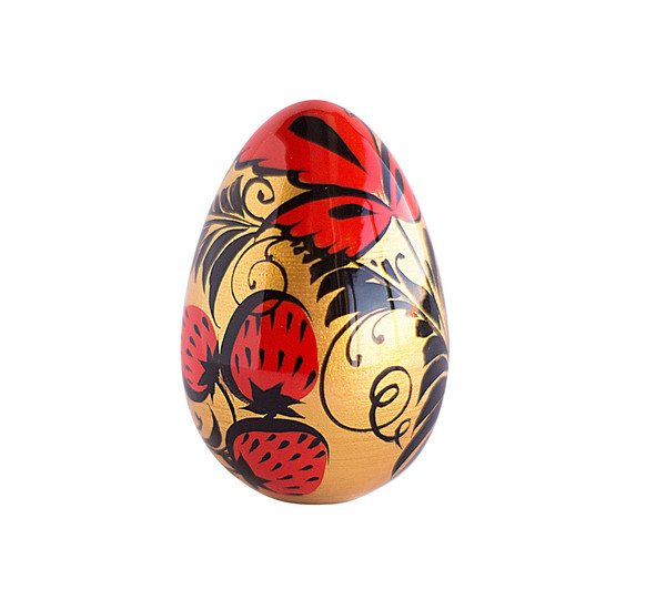 Russian Easter wooden painted egg Altai Khokhloma strawberries on a golden background