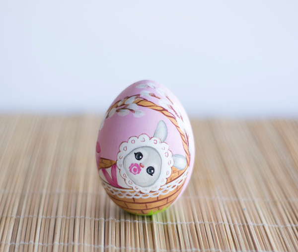 Easter wooden painted pink  egg with a baby bunny