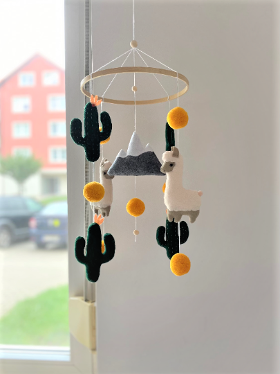 Cactus hanging baby mobile.png