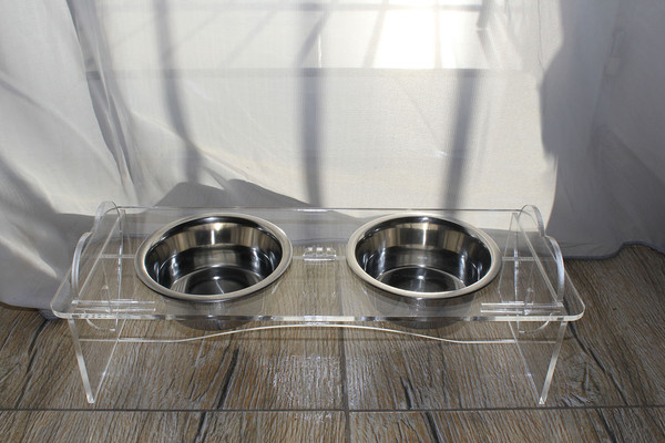 https://www.inspireuplift.com/resizer/?image=https://cdn.inspireuplift.com/uploads/images/seller_products/1674665020_acrylic-dog-bowls-stand.jpg&width=600&height=600&quality=90&format=auto&fit=pad