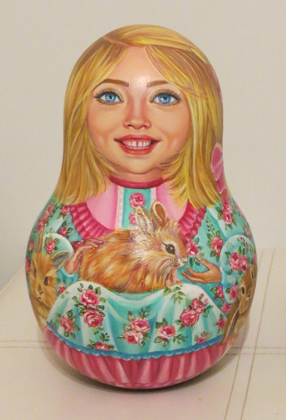 russian girl wooden music roly poly with rabbits