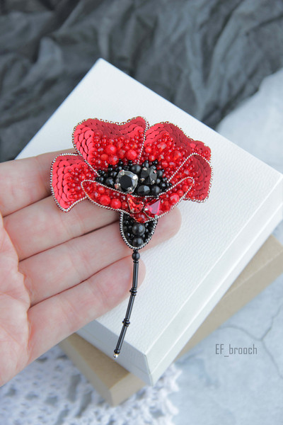 Poppy bead brooch