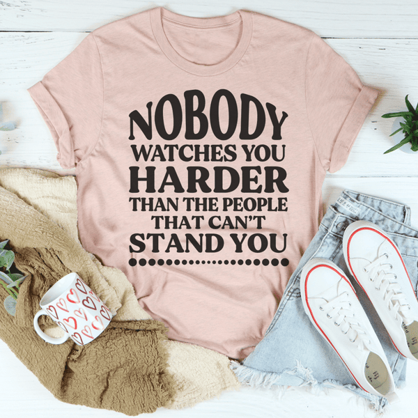 nobody-watches-you-harder-than-the-people-that-can-t-stand-you-tee-peachy-sunday-t-shirt
