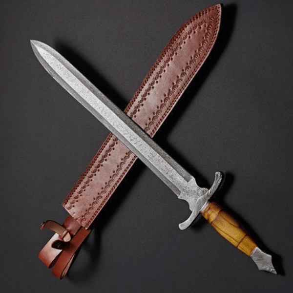 https://www.inspireuplift.com/resizer/?image=https://cdn.inspireuplift.com/uploads/images/seller_products/1676615116_HandmadeDamascusSteelHuntingSwordWithLeatherSheath.png&width=600&height=600&quality=90&format=auto&fit=pad
