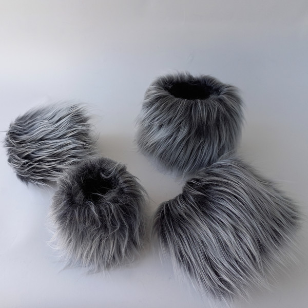 Wrist and ankle cuffs in faux wolf fur.