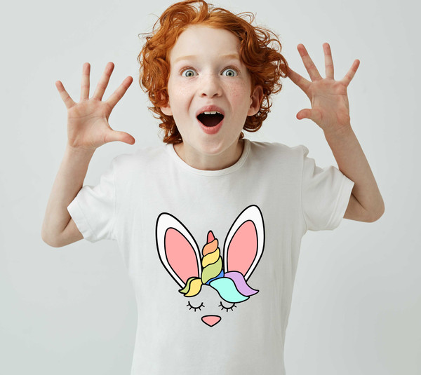 little-cute-boy-with-ginger-hair-white-t-shirt-having-fun-home-popping-eyes-with-opened-mouth.jpg