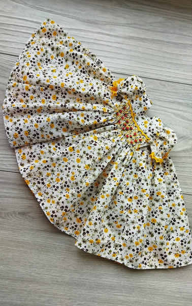 Little Darling floral print smocked dress with yellow trim..jpg