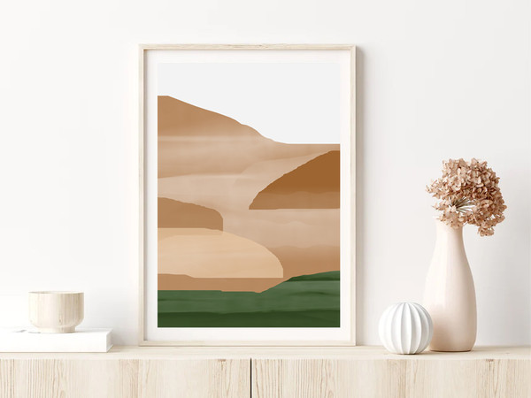 Three abstract posters with mountains in terracotta colors