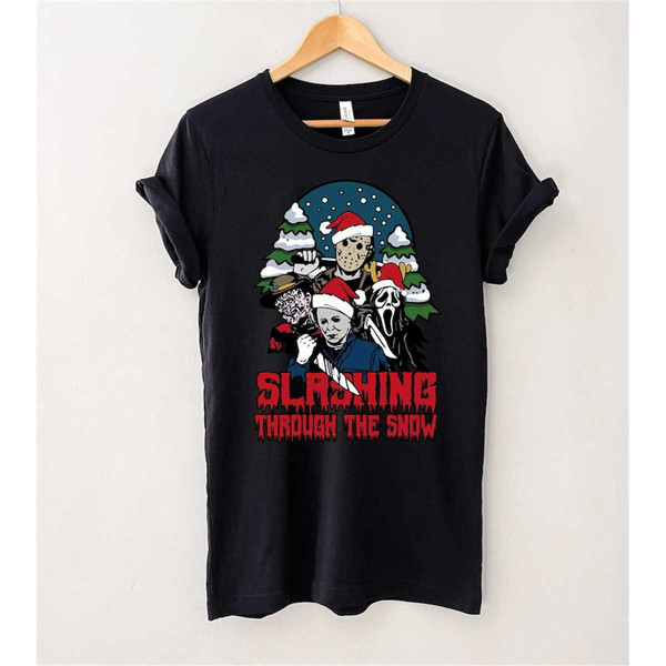 MR-2042023184928-slashing-through-the-snow-t-shirt-christmas-shirt-horror-image-1.jpg