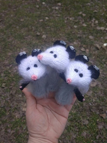 set of cute opossum finger puppets
