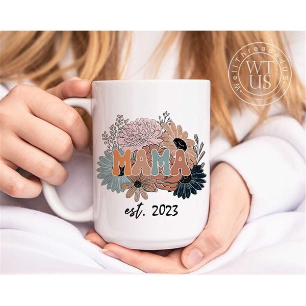 https://www.inspireuplift.com/resizer/?image=https://cdn.inspireuplift.com/uploads/images/seller_products/1686126124_MR-76202316220-custom-mama-mugmothers-day-mug-for-new-mom-personalized-mom-image-1.jpg&width=600&height=600&quality=90&format=auto&fit=pad