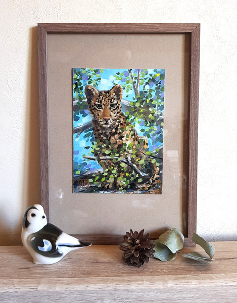Leopard in the leaves of a tree.3.jpg