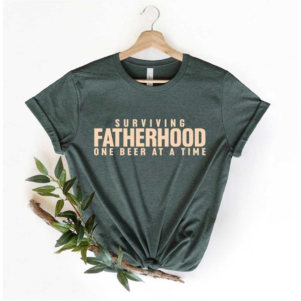 MR-227202313357-surviving-fatherhood-one-beer-at-a-time-shirt-husband-gift-image-1.jpg