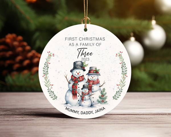 Personalised First Christmas As A Family Of Three Snowman Ceramic Ornament Home Decor Christmas Round Ornament - 4.jpg