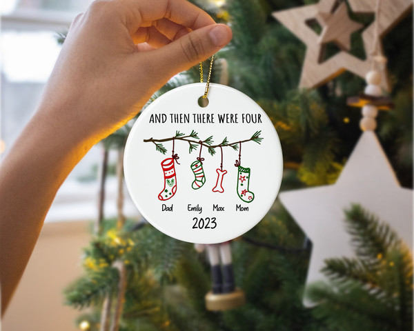 https://www.inspireuplift.com/resizer/?image=https://cdn.inspireuplift.com/uploads/images/seller_products/1697787590_AndThenThereWereFourOrnament2023ChristmasOrnamentFamilyChristmasOrnamentFamilyandBabyandPetOrnamentChristmasDecor-6.jpg&width=600&height=600&quality=90&format=auto&fit=pad