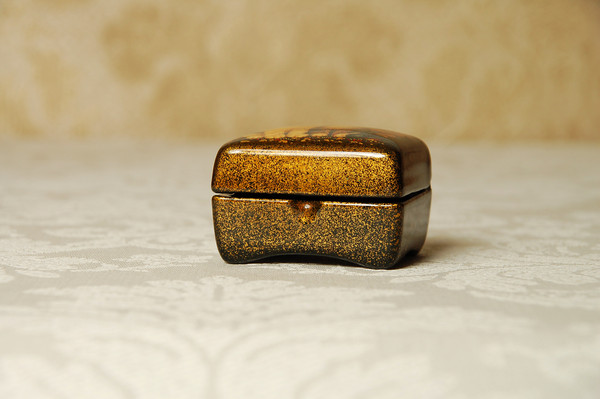 small golden lacquer box