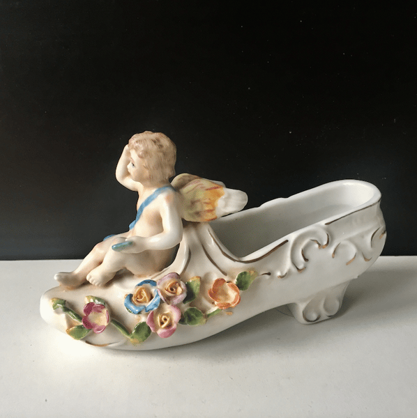 Porcelain Cherub , Angel On Flowered Shoe