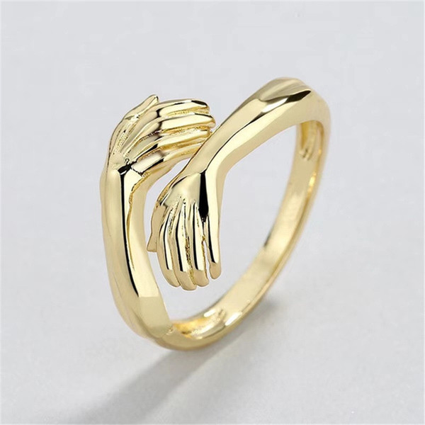 WhL2Classic-Creative-Silver-Color-Hug-Rings-for-Women-Fashion-Metal-Carved-Hands-Open-Ring-Birthday-Party.jpg